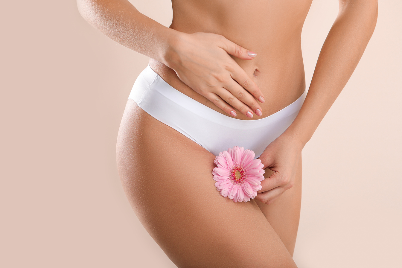 Young Woman with Flower Wearing Underwear