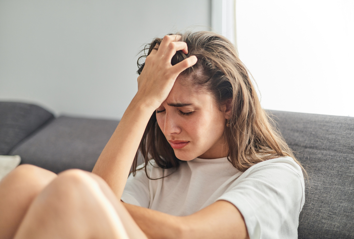 Young teenager crying with anxiety and depression problems